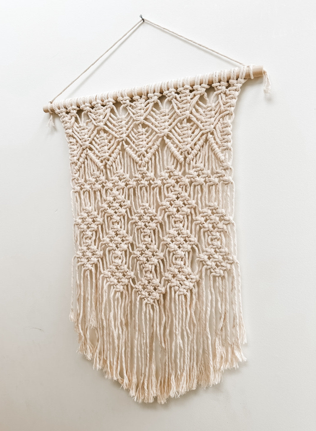 White macrame wall hanging