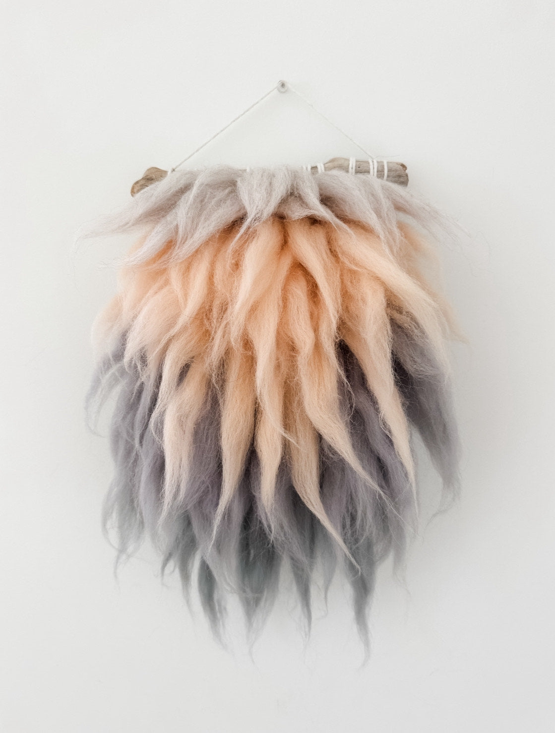 Fluffy grey and pink wool roving